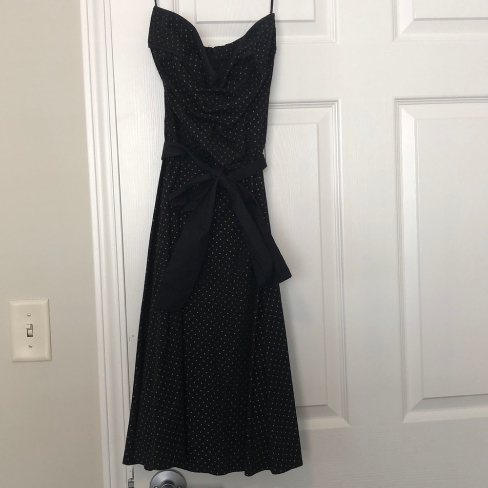 Black dress with gold polka dots